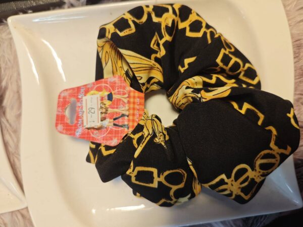 1752041355741 black hair bands gold